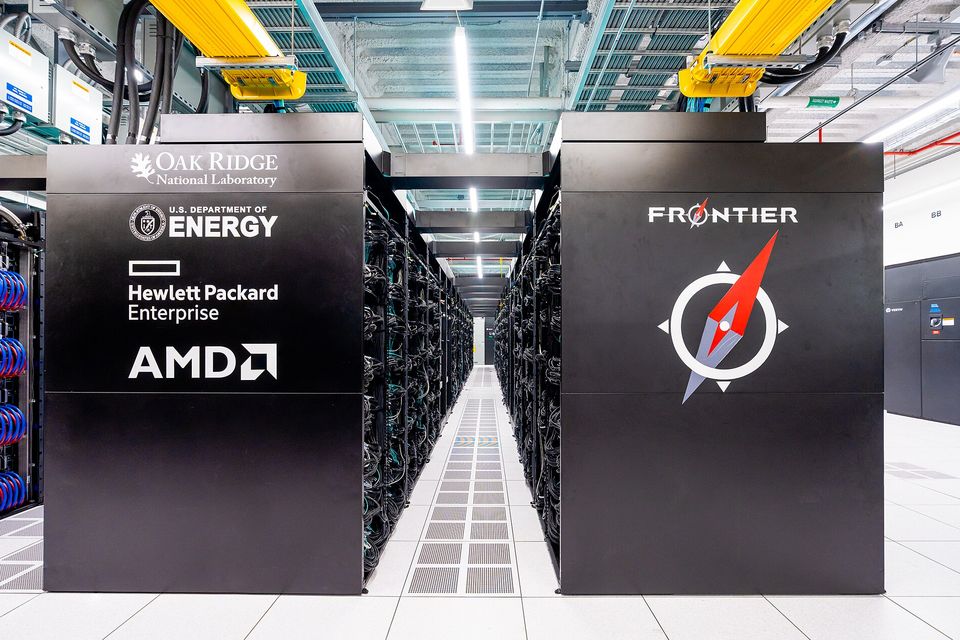 Rows of cabinets in the Frontier supercomputer hall at Oak Ridge National Laboratory
