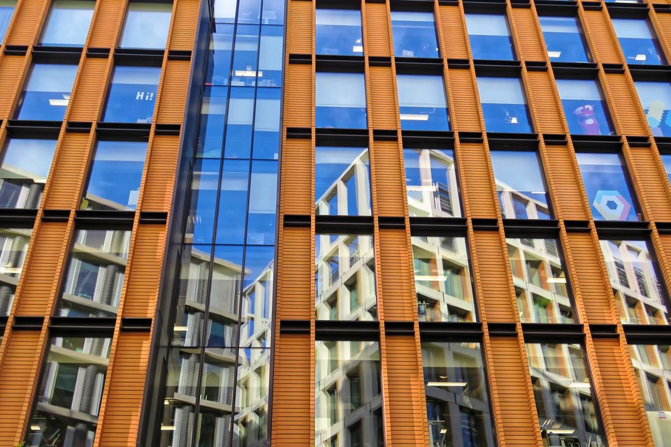 The terracotta and glass facade of Google's building at 6 Pancras Square, King's Cross